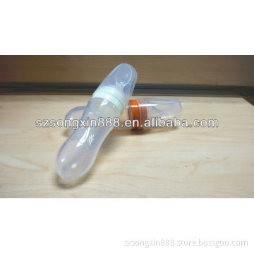 Silicone baby feeding bottle with spoon